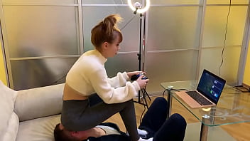 Preview 2 of Fuck The Mom His Son - Gamer Girl Kira in Grey Leggings Uses Her Chair Slave While Playing During Fullweight Facesitting (Preview)