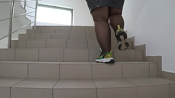 Preview 4 of Brazzers Massaging Videos - Public foot fetish. Fat legs in nylon pantyhose and a juicy PAWG on the stairs in the mall. Under the skirt.