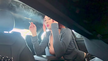Preview 1 of Dubai Girls Sex Bideo - Italian Big Tits MIlf Artemisia Love Showing her big horny tits while smoking in the car ,  ponytal long hair fetish