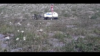 Preview 1 of Young Vs Biggest Dick - The sexy bitch sits on the beach and then he gives her a blowjob