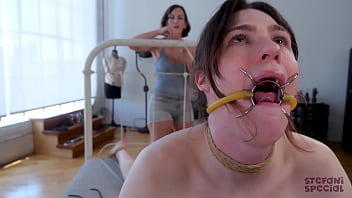 Preview 1 of Www Oopsmovs Com - Back Bend Neck Rope Dildo Gagging Electro Shocked Ass Until Tgirl Breaks