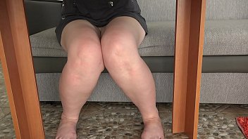 Preview 4 of Boydyju Ki Gand Maran - A hidden camera under the table spies on plump legs and peeks under the skirt while a mature housewife drinks tea. Amateur foot fetish.