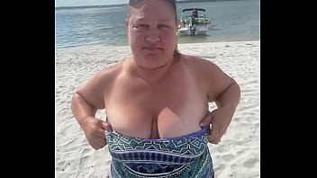 Preview 3 of Shemale In Chastity Cage - Slutty Bbw duca wife flashes her big tits on a public beach