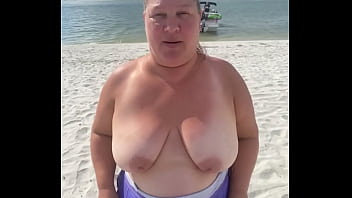 Preview 4 of Shemale In Chastity Cage - Slutty Bbw duca wife flashes her big tits on a public beach