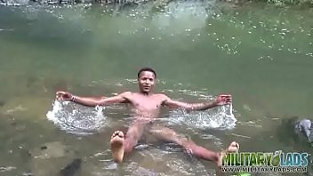 Preview 4 of Amerekan Sex Videos - Brown soldier strips naked by the stream
