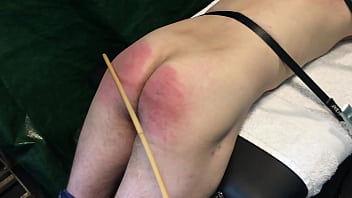 Preview 1 of Flight Attendant Squirt - caned ass strapped down