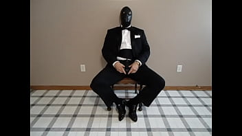 Preview 3 of Jabardasti Desi In - Seated in a tuxedo wearing a rubber cock and ball sheath and playing with my cock until I cum.