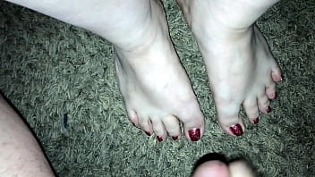 Preview 1 of Rico Jerico - Sexy cumshot on sluts beautiful feet (Red Toenails).mov