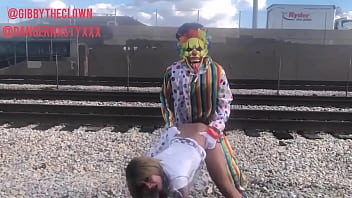 Preview 1 of Sex Tourism In Romania - Clown fucks girl on train tracks