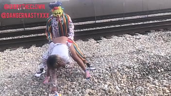 Preview 4 of Sex Tourism In Romania - Clown fucks girl on train tracks