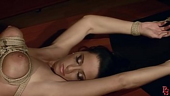 Preview 1 of Nude Ta Guele - Gorgeous busty milf Andy Moon,  tied and dominated by her boss. BDSM bondage sex movie.