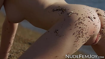 Preview 2 of Karen Messer - Striking babe sits by the sea and teases with her soft pussy