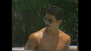 Preview 1 of Australian Porn Pegging Handjob - Basty tranny babe and her blonde girlfriend get their assholes drilled by lucky guy near by the pool