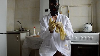 Preview 2 of 8tenxxx Hd - guy in the medical gown puts on three layers of gloves
