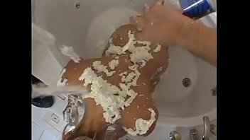 Preview 1 of Pure Evil Porn - Guy licks MILF Kat Kleevage cream covered tits before pounding her in the bathtub