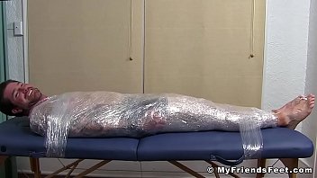 Preview 1 of Sex Video Gal Gal - Jock Clint wrapped up to have his feet tickled BDSM style