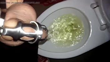 Preview 3 of Wapttick Com - Tomsfag pissing in the public toilet while locked in a chastity cage
