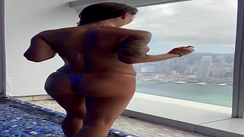 Preview 4 of Sixi Full Video - Monika Fox In Purple Bikini Swims In Pool &amp_ Poses By Window Against Background Of City (Free)