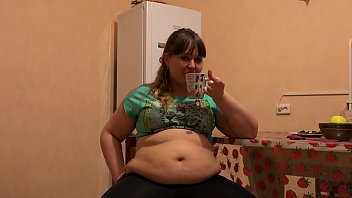 Preview 4 of Sexwithcondum - A beautiful bbw in leggings and with a big belly eats and shakes a thick stomach. Home fetish.