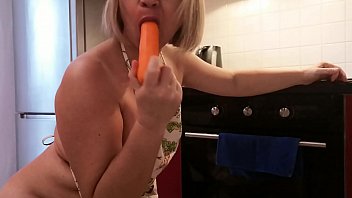 Preview 2 of Irani Sex Virgin Blood - The blonde is excited in the kitchen and plays with vegetables to enjoy a strong orgasm.