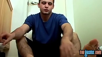 Preview 1 of Battery Sis - Horny jock takes his shoes off for bare feet masturbation