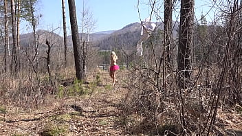 Preview 2 of Japanese Schoolgirl Rape - Fusion with nature in the outdoors. Blonde with a big ass strips in the forest and with a bare natural hairy pussy playing with a spruce twig.