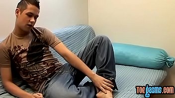 Preview 1 of Assfixation Com - Amateur gay plays with his small cock while showing off his feet