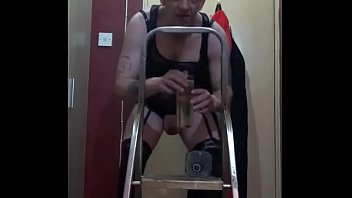 Preview 3 of Cikgu Tudung Hiaju - crossdressing bisexual sissy loves the taste of his own piss as he stands on a ladder pissing in a bottle