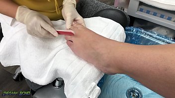 Preview 1 of Leeli Lakx - Chubby Slut gets a pedicure and gives a footjob