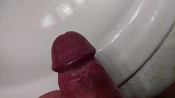 Preview 1 of Irene Noren - Golden shower in the bathroom sink
