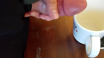 Preview 2 of New Sex Usa - DickTracySr cum in coffee cup. Cream for coffee?