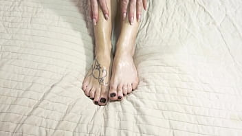 Preview 1 of Black Mel - Lara De Santis - homemade footjob with cum on the feet