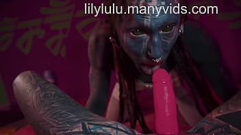 Preview 1 of Ils Lan - Heavily tattooed shemale get fucked with a strapon