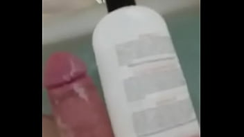 Preview 2 of Ggw Sweet - HUNGarian Big DICK measuring against family sized shampoo jug
