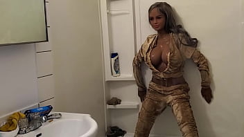 Preview 2 of Public Peeing Festival - Doll Showers &amp_ Gets Golden Tracksuit Wet!