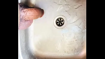 Preview 1 of Father And Mother Wu - Washing my BBC in the kitchen sink before washing the plates. FULL CUM VIDEO IN RED. Who wants my Dick?