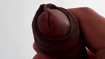 Preview 1 of Black Bis Ass - Slowly stroking my uncircumcised cock,  extreme closeup. September 15,  2024.
