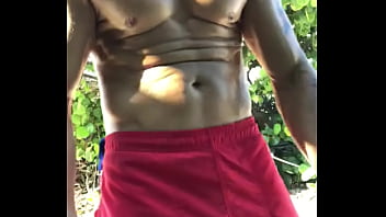 Preview 1 of Emilly Addison - BICEP FLEXING AT THE BEACH