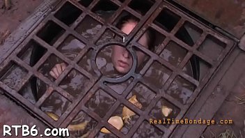 Preview 1 of Www18 Yu - Caged cutie removes her charming clothings in captivity