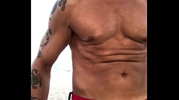 Preview 1 of Seed In Teen - BICEP FLEXING  AT THE BEACH