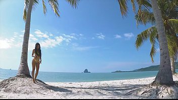 Preview 2 of Main Sek - Micro bikini tease by sexy teen who walks on a beach