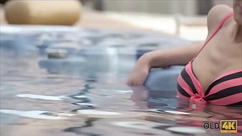 Preview 1 of Beutiful Huge Big Tits - OLD4K. Wet fucking action in the jacuzzi with an old man