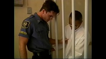 Preview 1 of Ngentot Sampai Keluar Mani - Prisoner is behind bars while blowing officer&#039_s dick