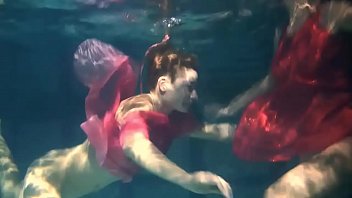 Preview 3 of Dani Daniles Videos - Two hot lesbians underwater touching each-other. y. s are naked in the pool. Young nudists ..