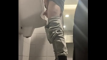 Preview 1 of Odisa Xnxx - 2 boys in sneakers having fun at public toilets&#039_ urinal