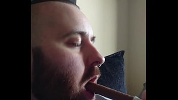 Preview 2 of Www Japani - Hot bearded guy gagging on chocolate bar.