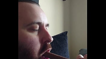 Preview 1 of Www Japani - Hot bearded guy gagging on chocolate bar.
