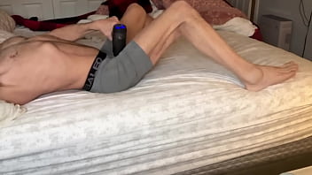 Preview 3 of Sumiko Wrestling - Stretching Tension in Bed with Massage Gun in on Bed in Tight Boxer Briefs July 2024