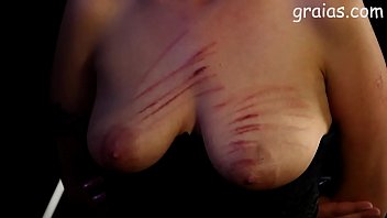 Preview 2 of Oil Tits - Young dominatrix punishes girl with big tits
