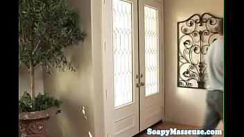Preview 1 of Coly Moley - Busty masseuse tugs and sucks clients cock